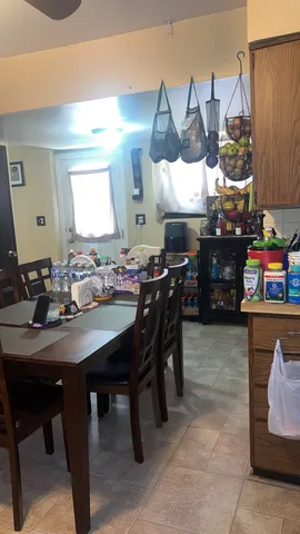 a view of a dining room kitchen and furniture