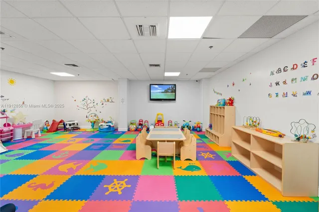 a room with lots of baby toys and toys