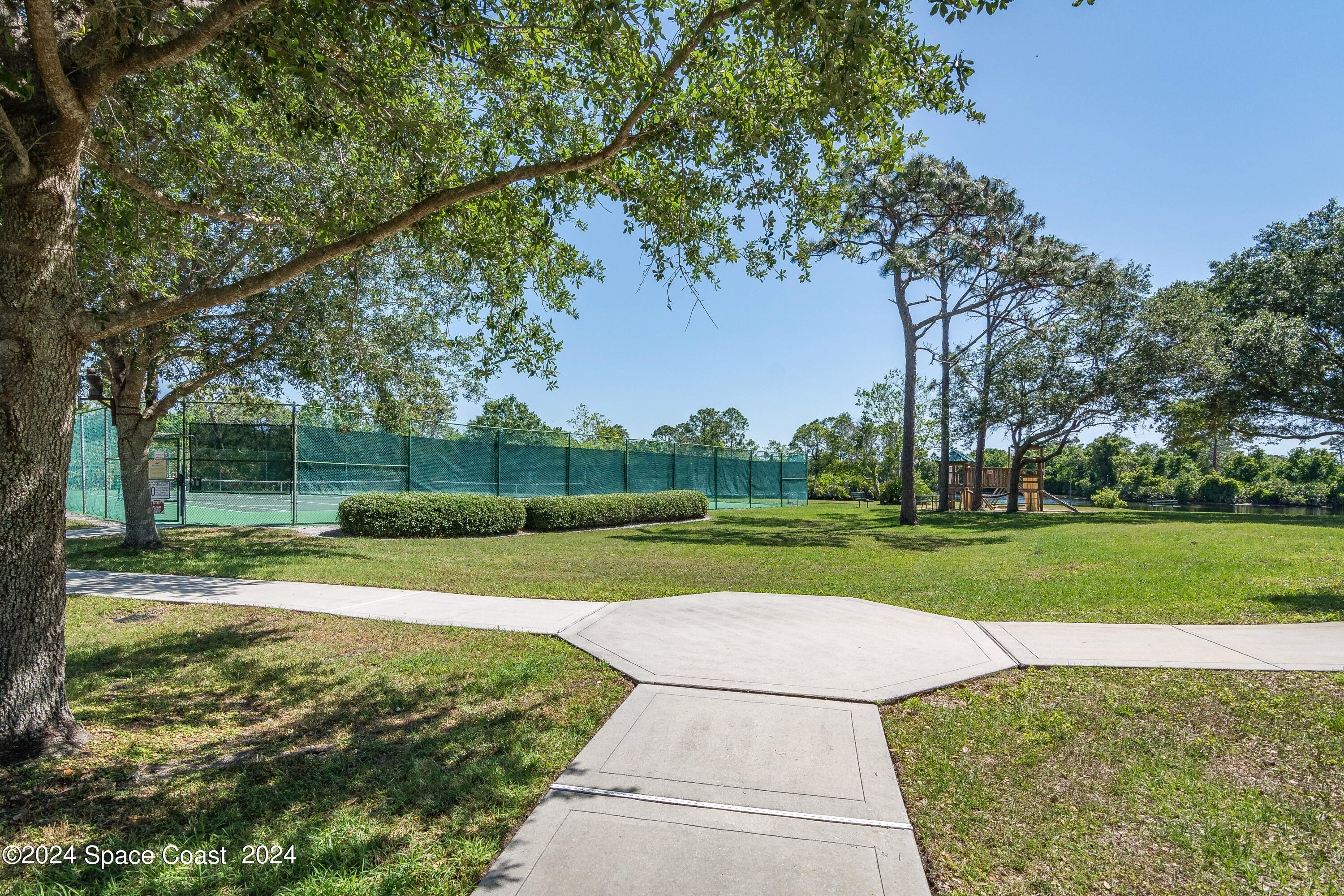 4383 Long Lake Road Melbourne, FL 32934 - Photo 50 of 58 a view of a park with large trees