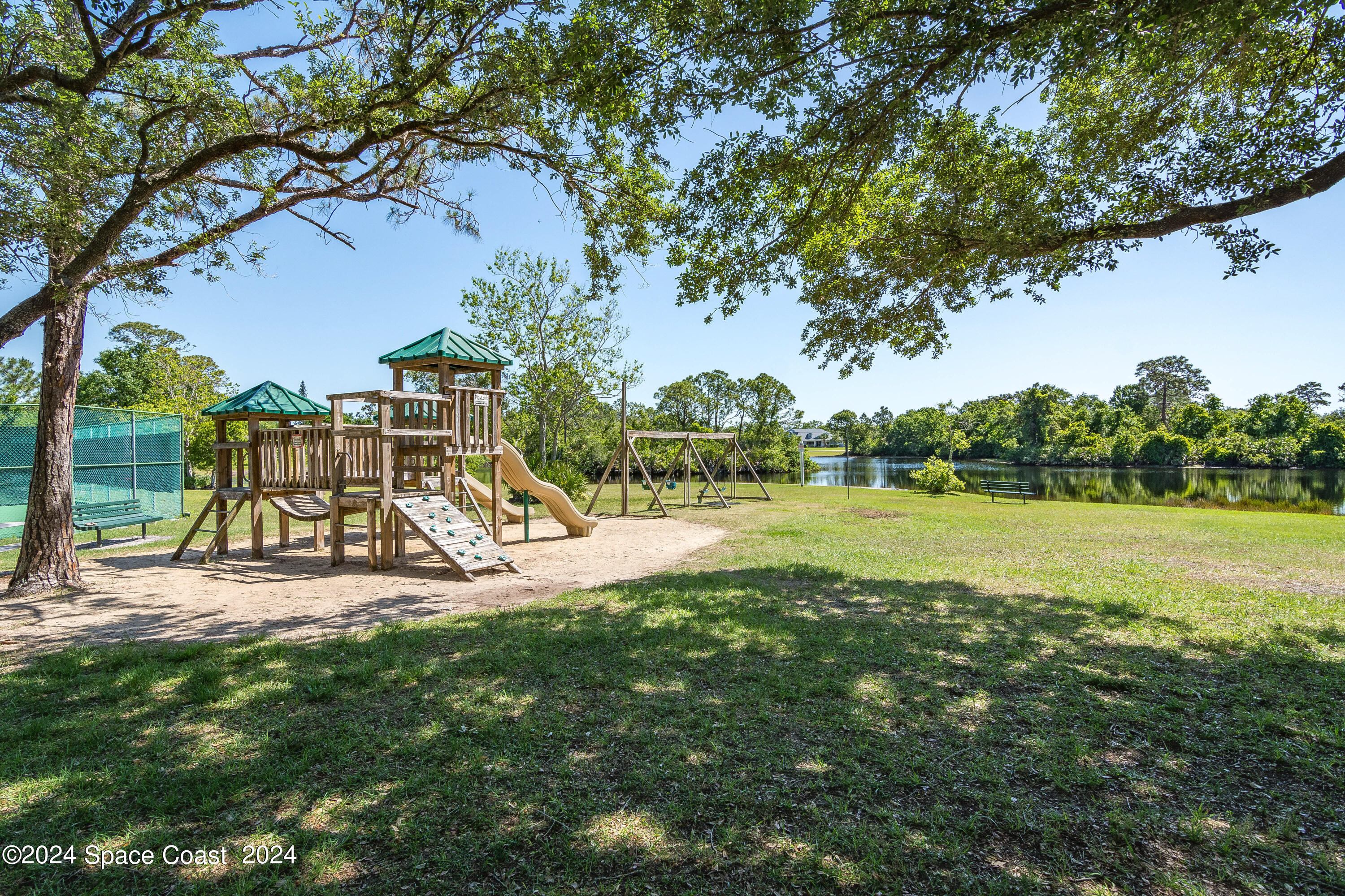 4383 Long Lake Road Melbourne, FL 32934 - Photo 51 of 58 a view of a park with large trees