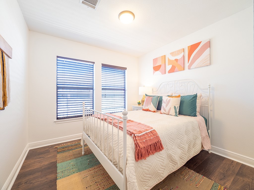 3257 Elizabeth Anne Lane Round Rock, TX 78664 - Photo 17 of 31 a bedroom with a bed and a window