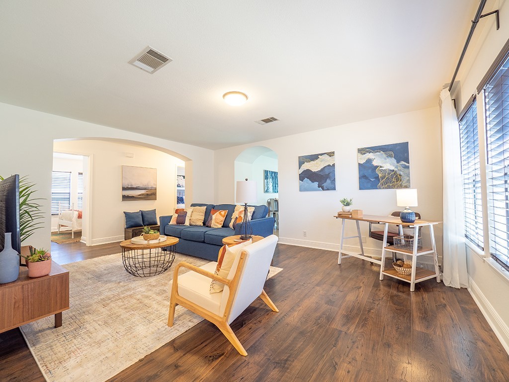 3257 Elizabeth Anne Lane Round Rock, TX 78664 - Photo 5 of 31 a living room with furniture and a wooden floor