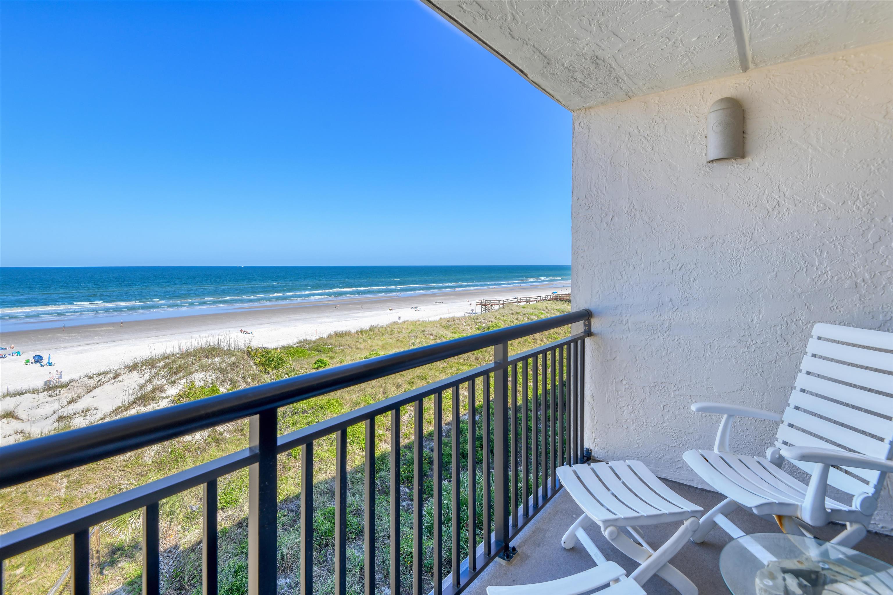 6970 A1A South, Unit 433 St. Augustine, FL 32080 - Photo 13 of 36 a view of a balcony with wooden floor