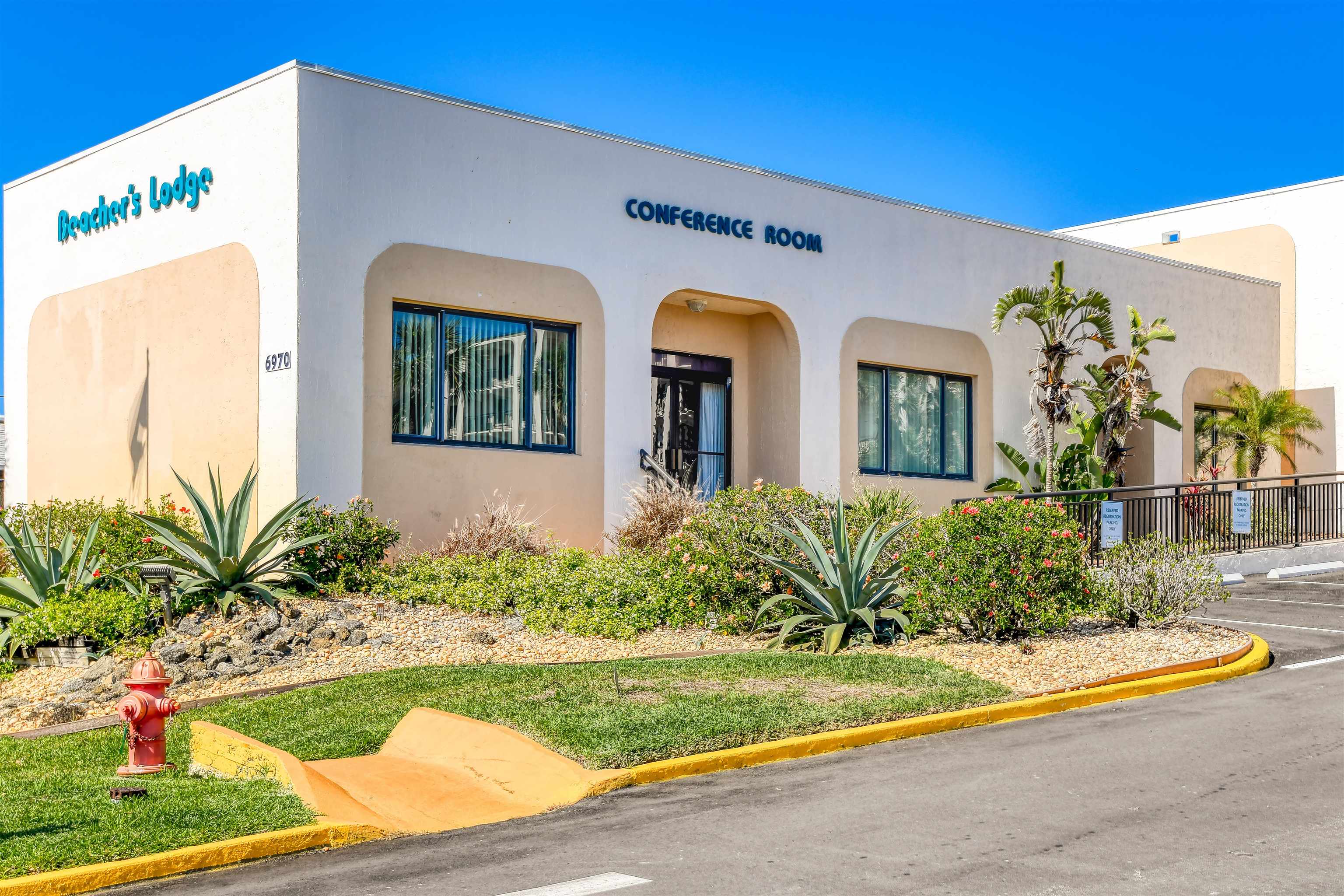 6970 A1A South, Unit 433 St. Augustine, FL 32080 - Photo 23 of 36 a front view of a house with garden