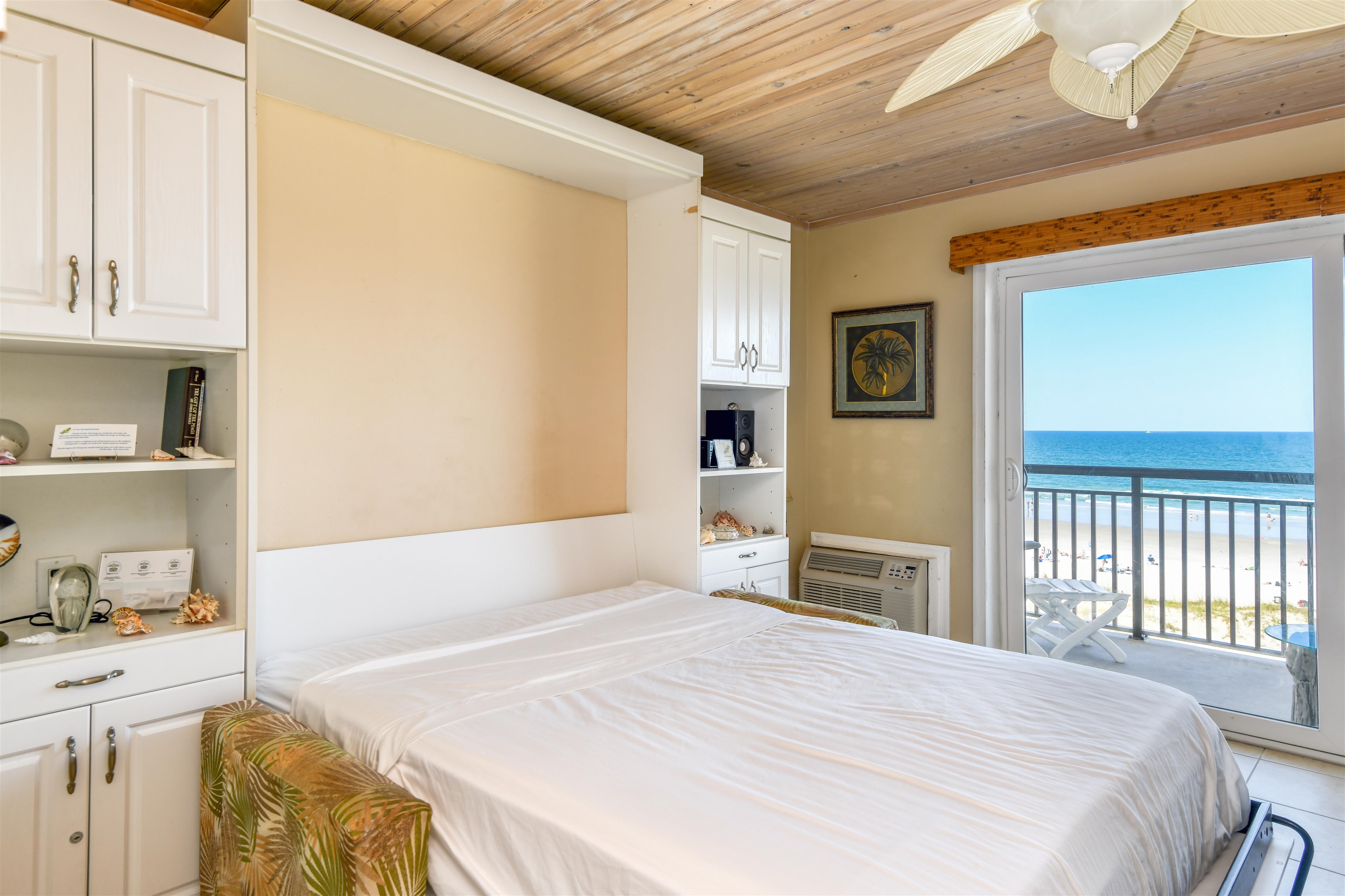 6970 A1A South, Unit 433 St. Augustine, FL 32080 - Photo 10 of 36 a bedroom with a bed and a window