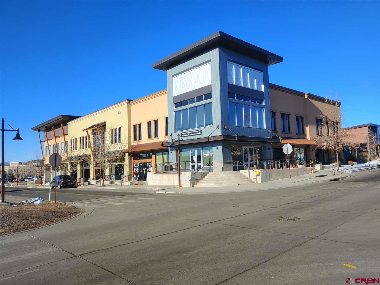 a view of a building with a street