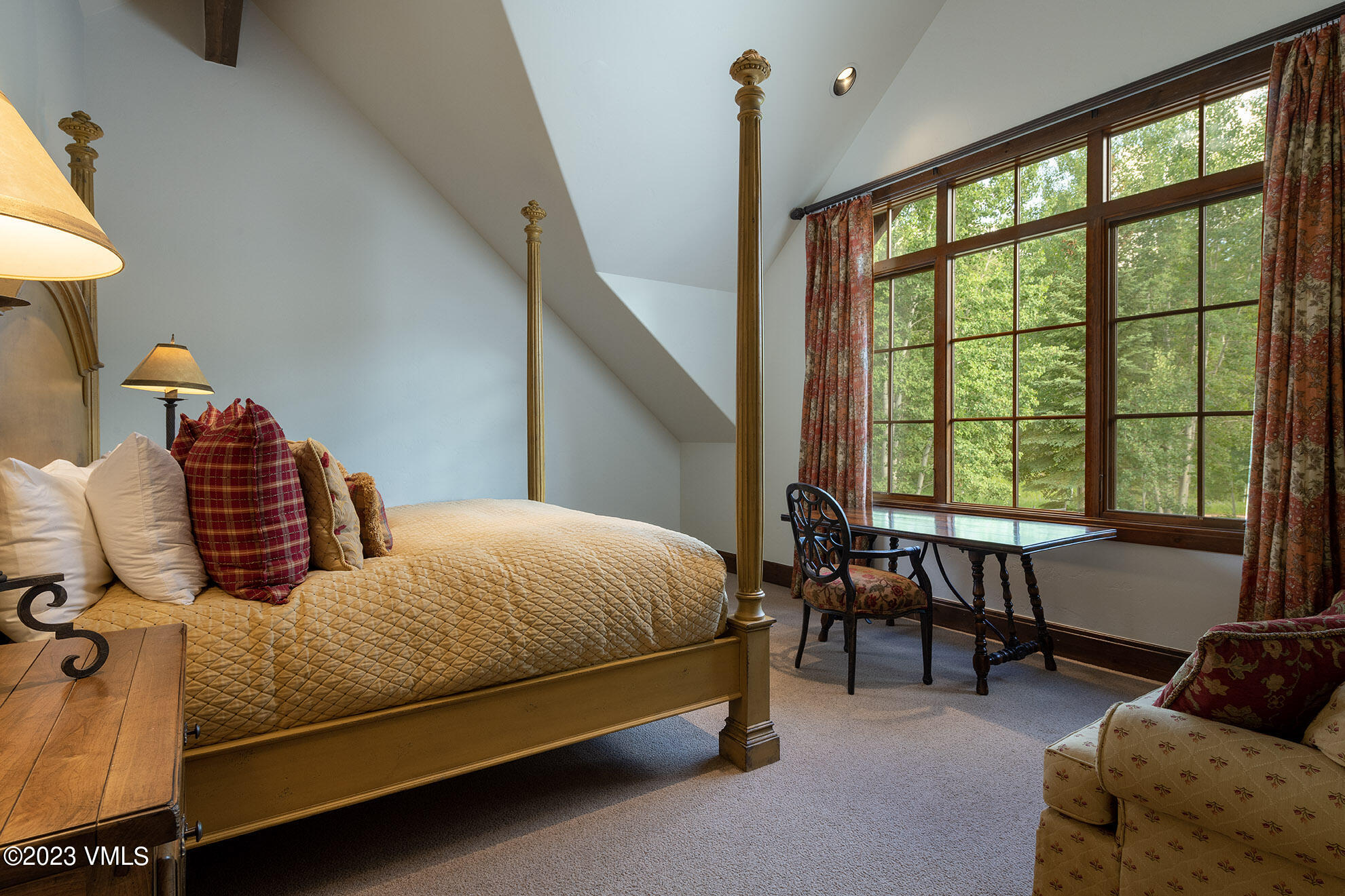 2156 Cresta Road Edwards, CO 81632 - Photo 14 of 19 a bedroom with a bed and a window