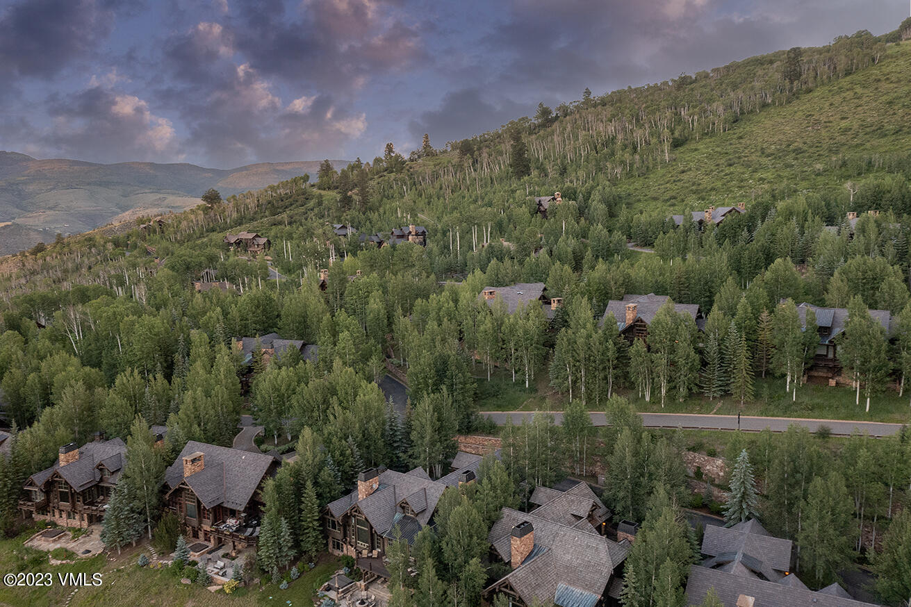 2156 Cresta Road Edwards, CO 81632 - Photo 19 of 19 a view of a chair and table in the garden