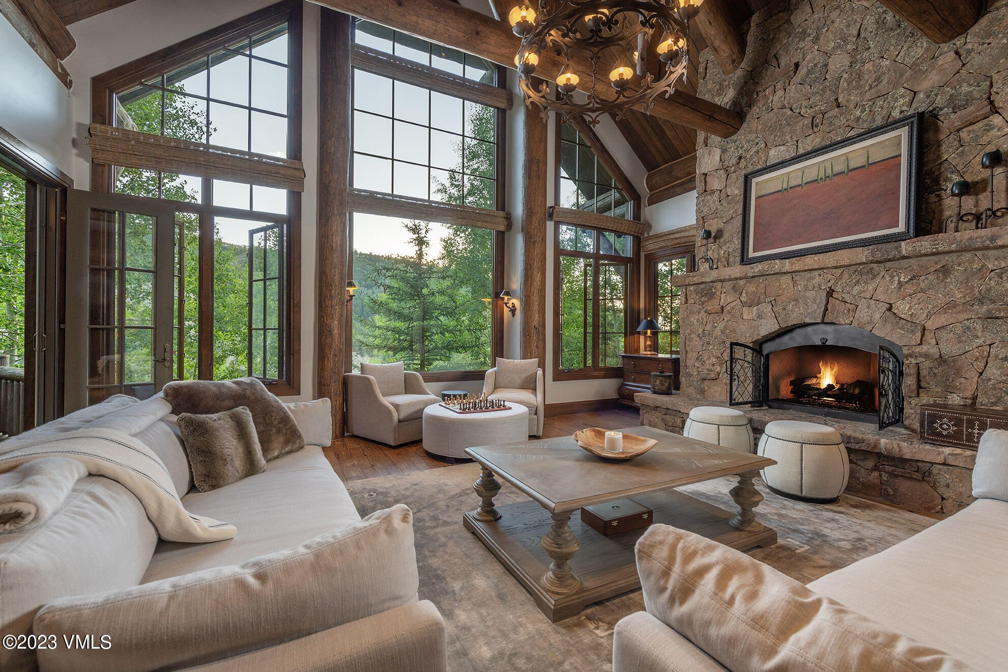 2156 Cresta Road Edwards, CO 81632 - Photo 3 of 19 a living room with furniture fireplace and a large window