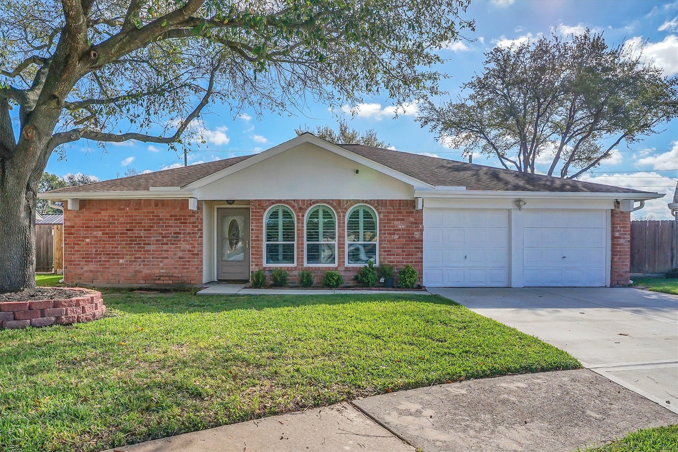 2310 Keyhole Lane Houston, TX 77084 - Photo 1 of 40 a front view of a house with a yard