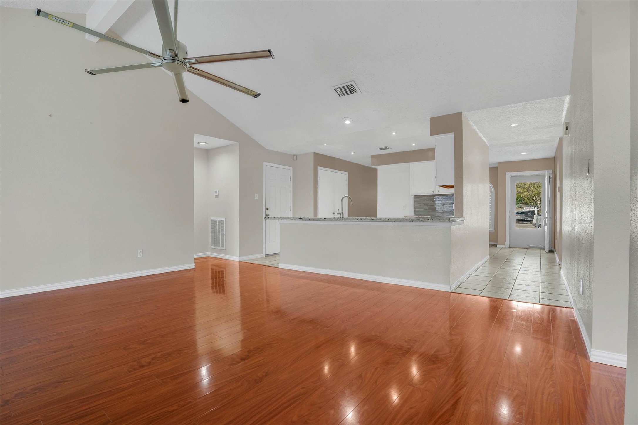 2310 Keyhole Lane Houston, TX 77084 - Photo 16 of 40 a view of a kitchen with a dishwasher and wooden floor