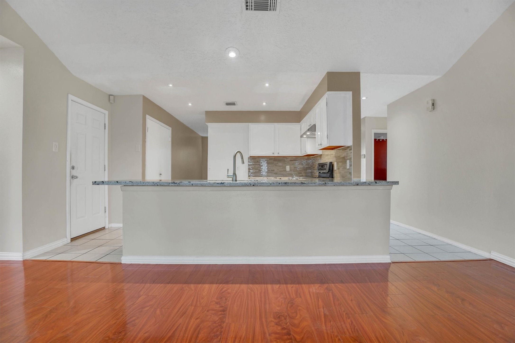 2310 Keyhole Lane Houston, TX 77084 - Photo 40 of 40 a view of kitchen with stainless steel appliances granite countertop a refrigerator sink and white cabinets