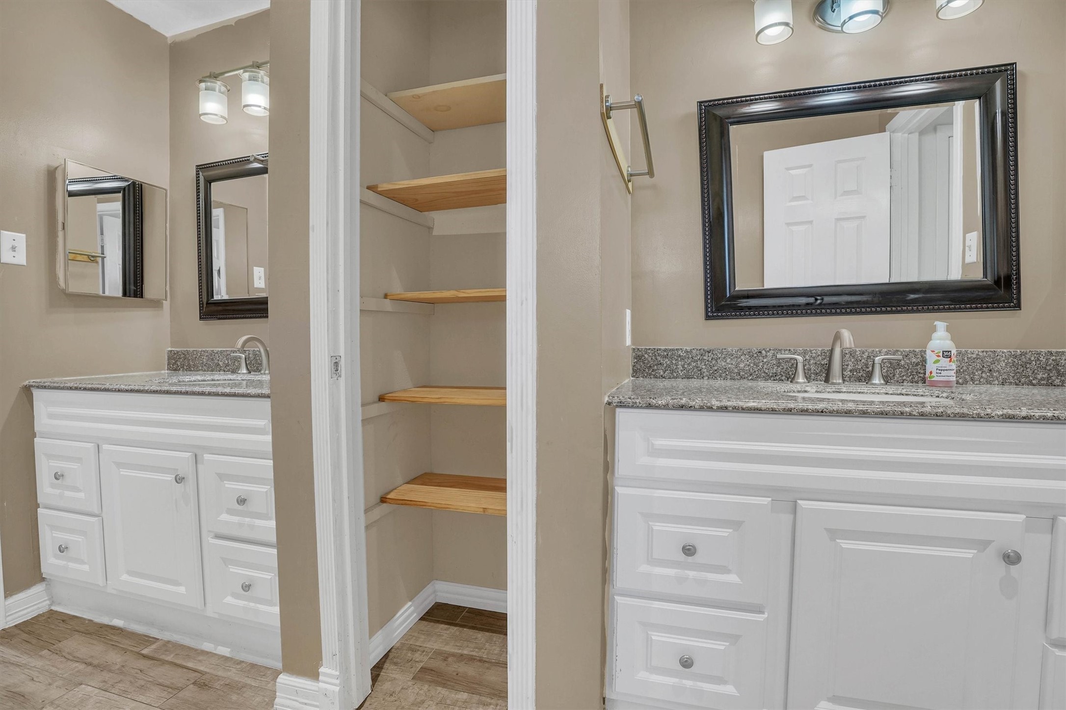 2310 Keyhole Lane Houston, TX 77084 - Photo 22 of 40 a bathroom with a granite countertop sink vanity and mirror
