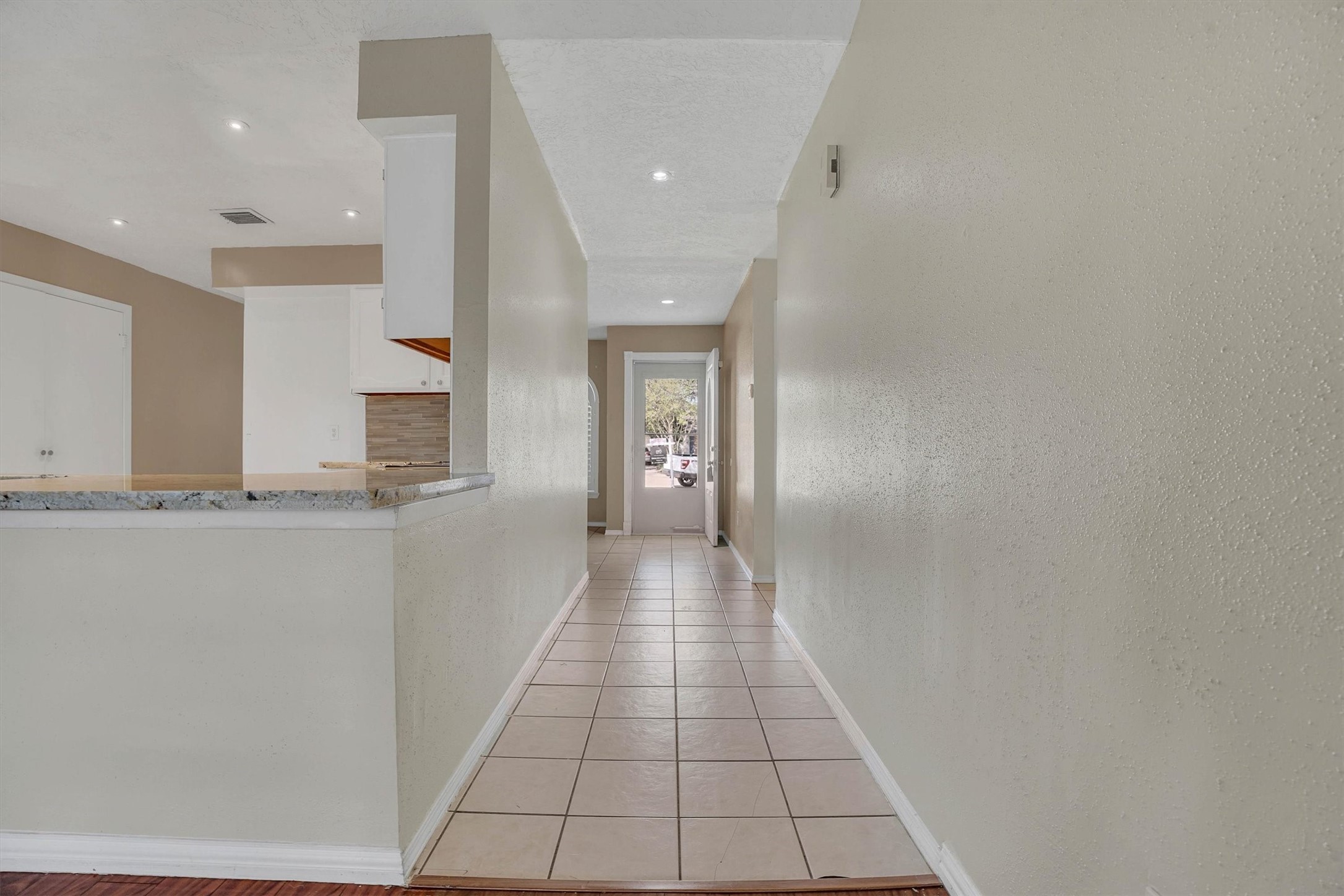 2310 Keyhole Lane Houston, TX 77084 - Photo 5 of 40 a hallway with a washer and dryer
