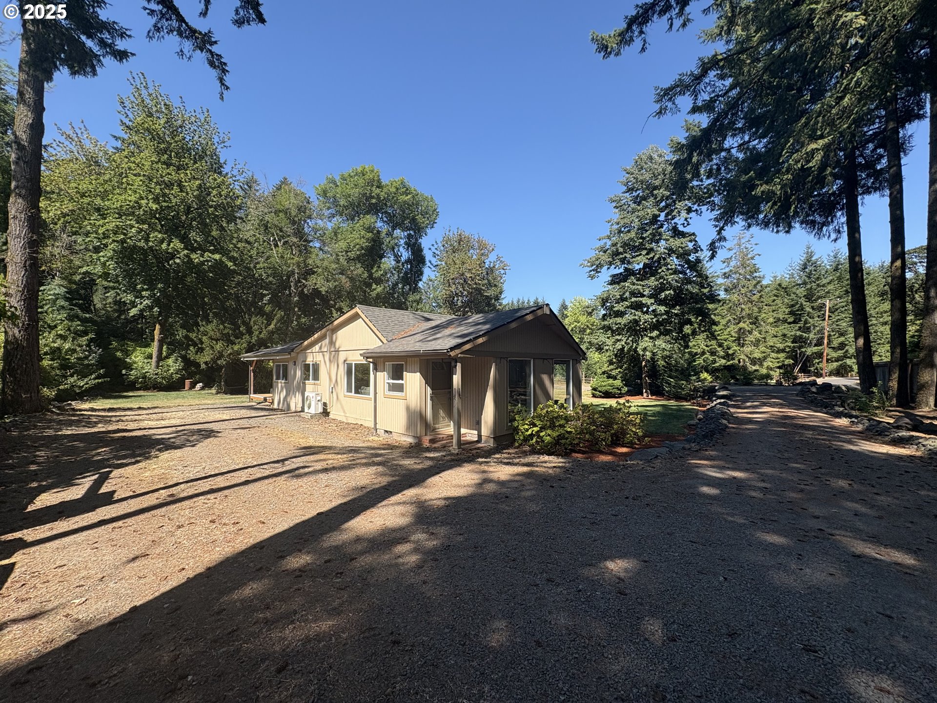 241 Rees Hill Road Southeast Salem, OR 97306 - Photo 1 of 40 a front view of a house with a yard and trees