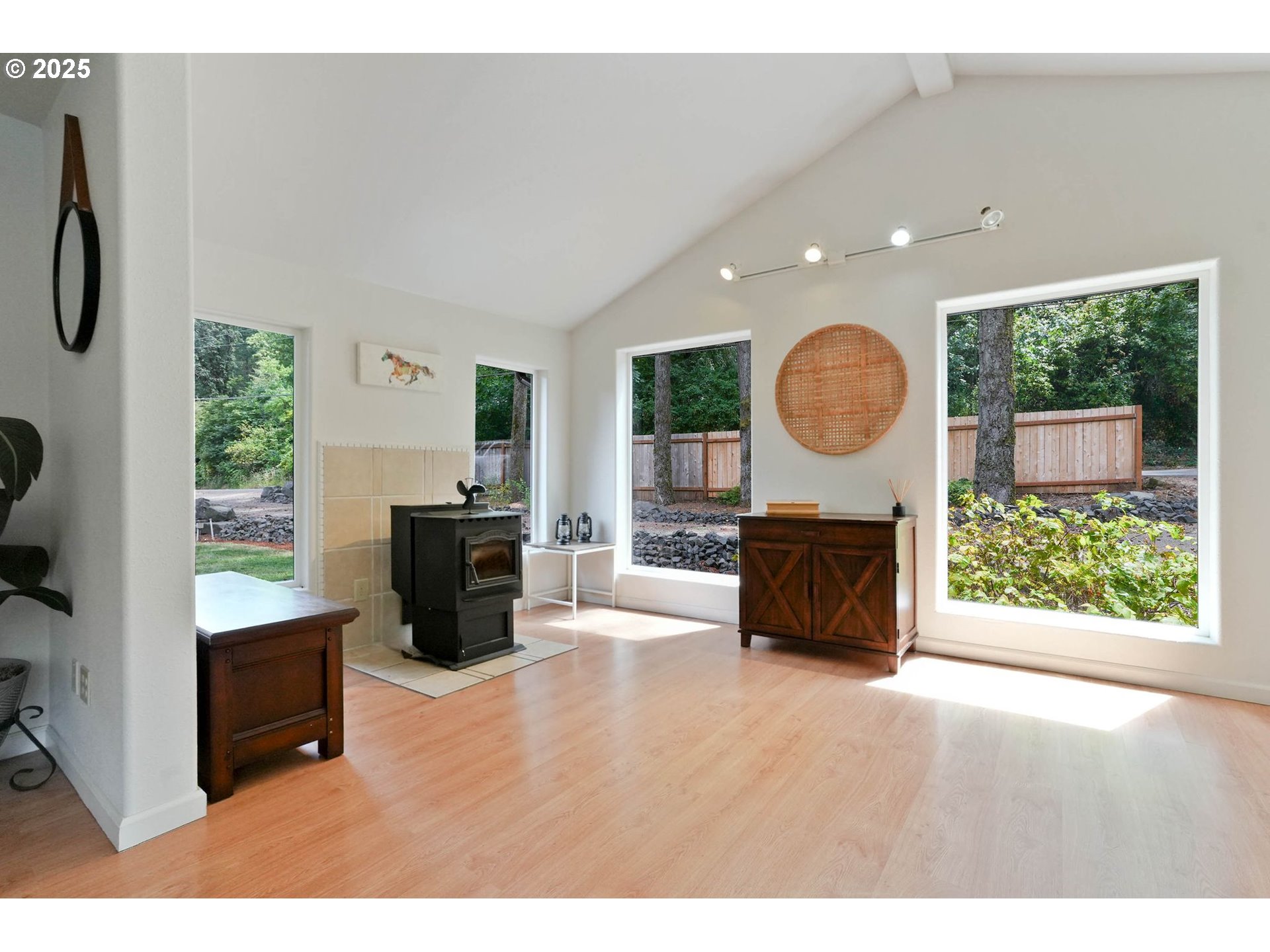 241 Rees Hill Road Southeast Salem, OR 97306 - Photo 11 of 40 a living room with furniture and a fireplace