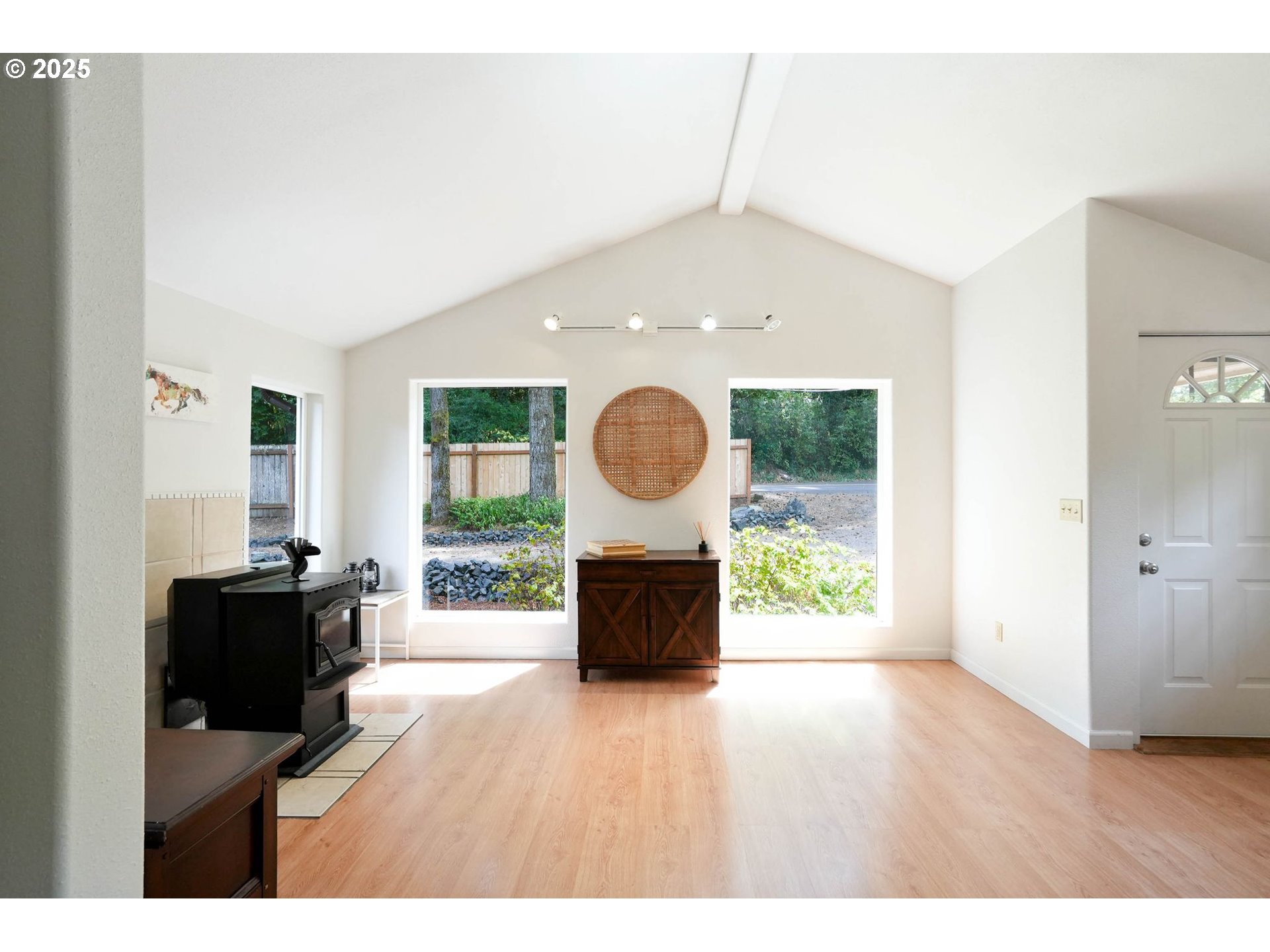 241 Rees Hill Road Southeast Salem, OR 97306 - Photo 12 of 40 a living room with furniture and a fireplace