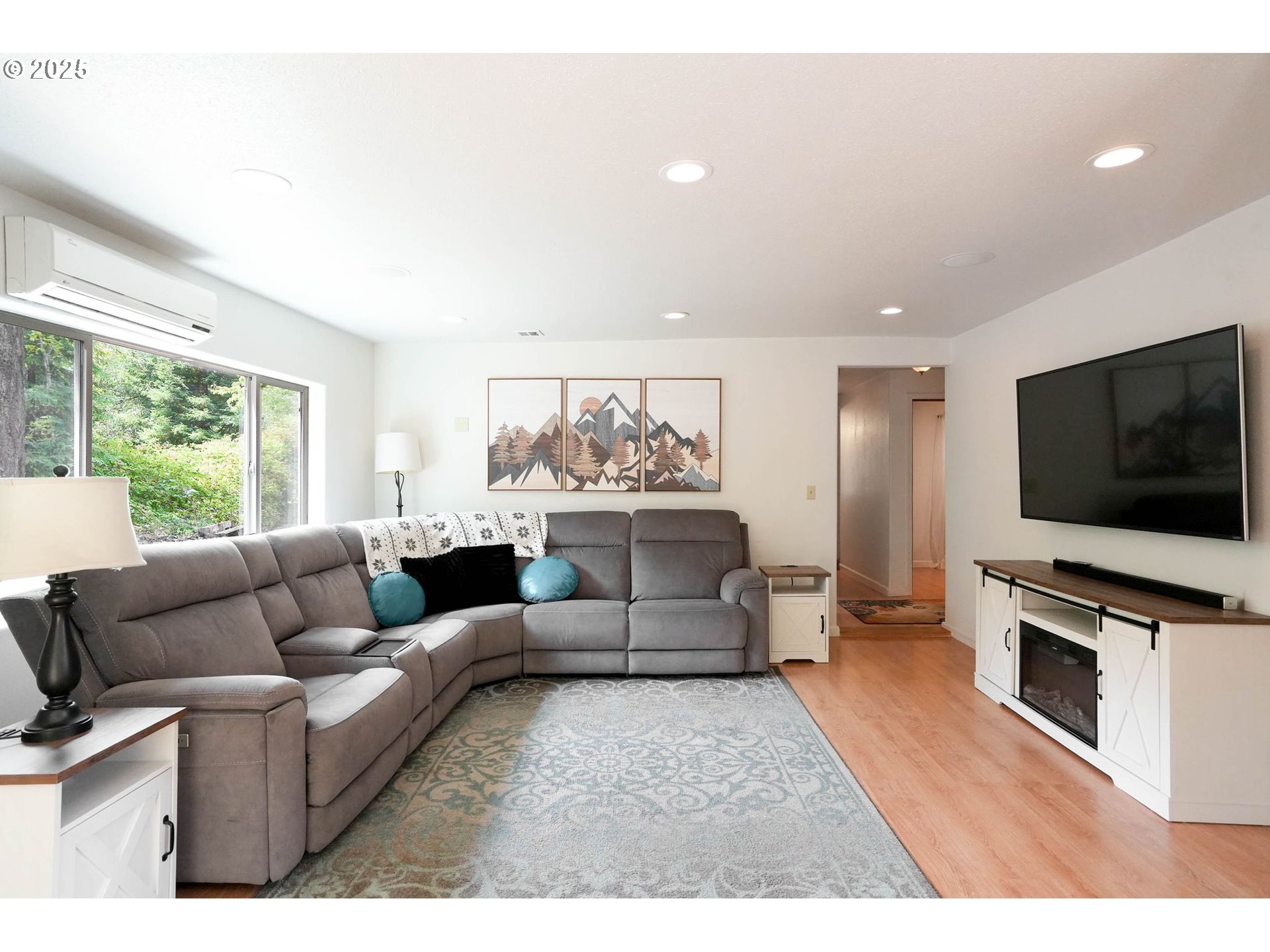 241 Rees Hill Road Southeast Salem, OR 97306 - Photo 13 of 40 a living room with furniture and a flat screen tv