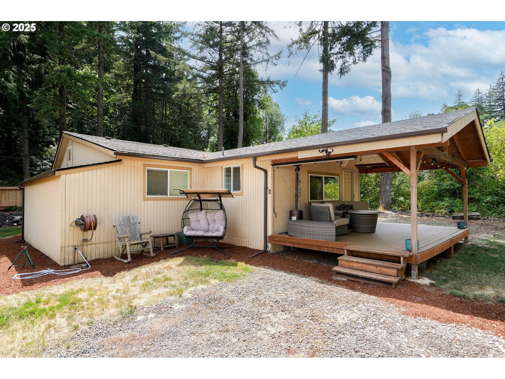 241 Rees Hill Road Southeast Salem, OR 97306 - Photo 31 of 40 a backyard of a house with barbeque oven table and chairs