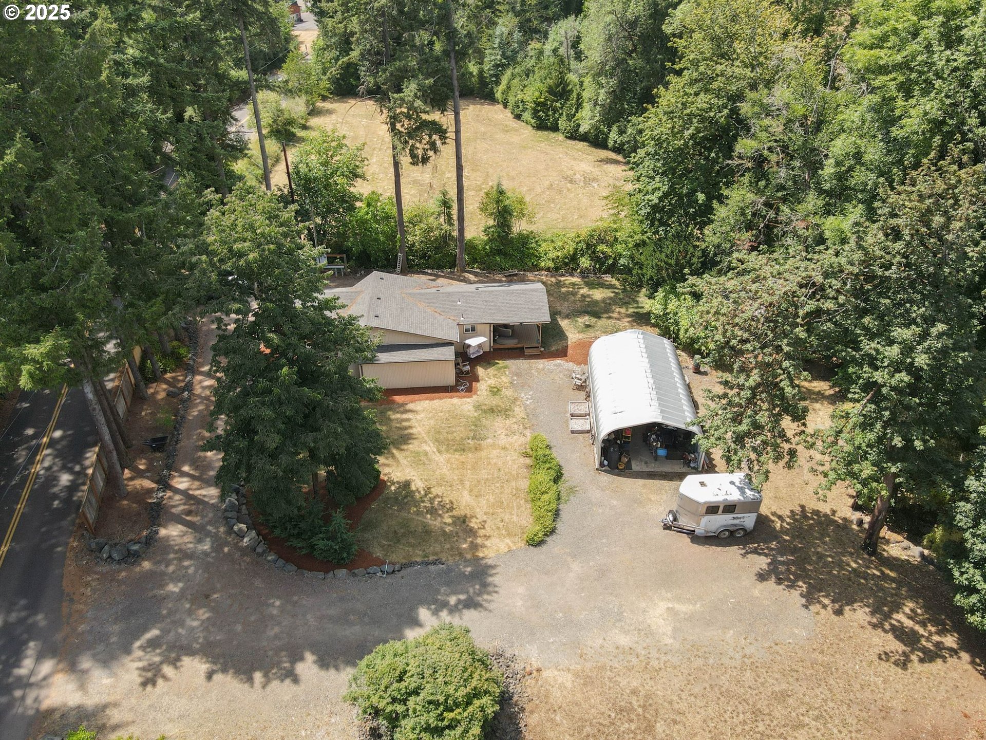 241 Rees Hill Road Southeast Salem, OR 97306 - Photo 5 of 40 a view of backyard with swimming pool and trees