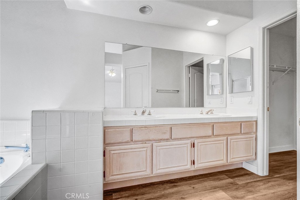 19581 Dorado Drive Lake Forest, CA 92679 - Photo 20 of 32 a bathroom with a sink and a mirror