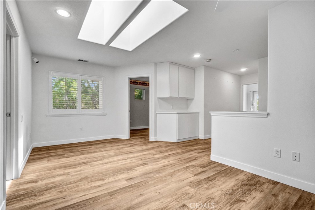 19581 Dorado Drive Lake Forest, CA 92679 - Photo 25 of 32 a view of empty room with wooden floor and window