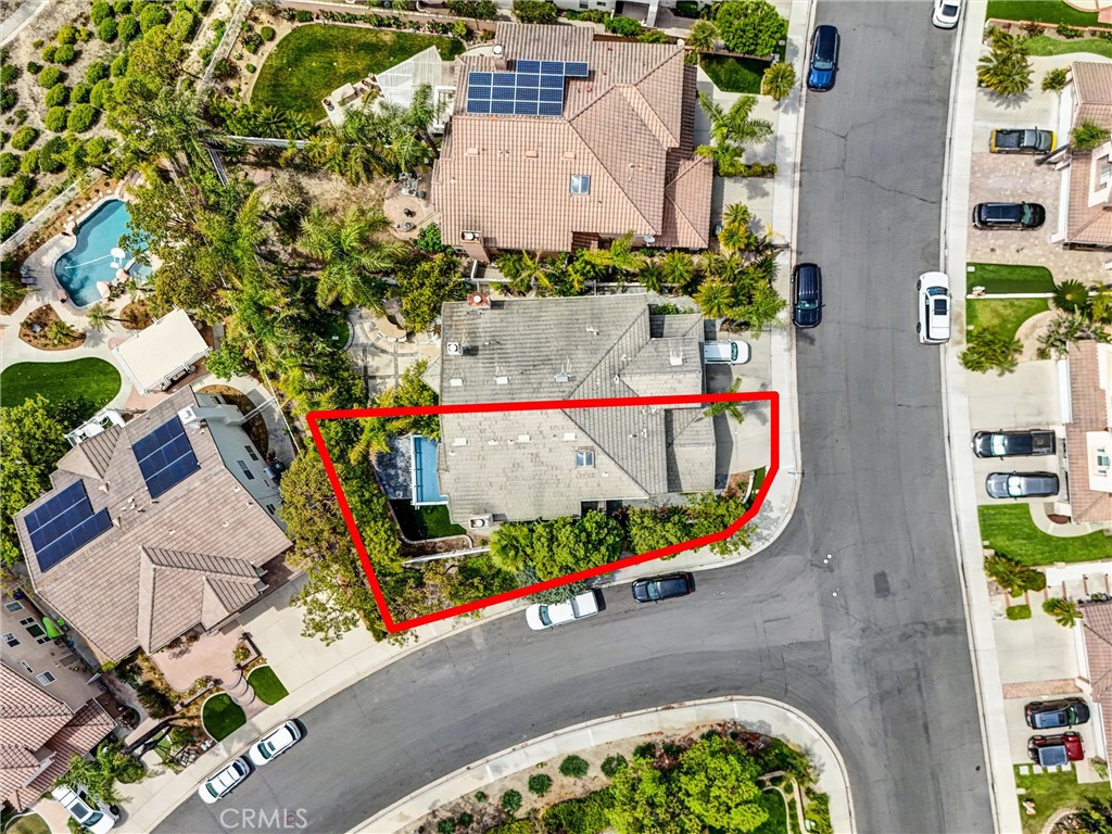 19581 Dorado Drive Lake Forest, CA 92679 - Photo 31 of 32 an aerial view of a swimming pool with a yard and plants