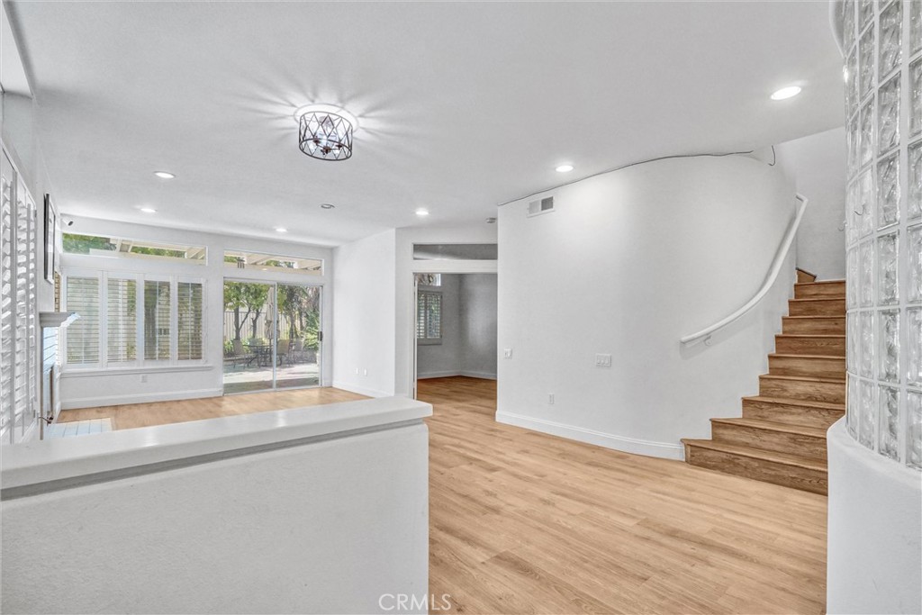 19581 Dorado Drive Lake Forest, CA 92679 - Photo 4 of 32 a view of an entryway with wooden floor and door