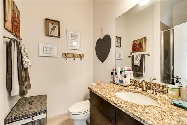 a bedroom with a bed and a walk in closet