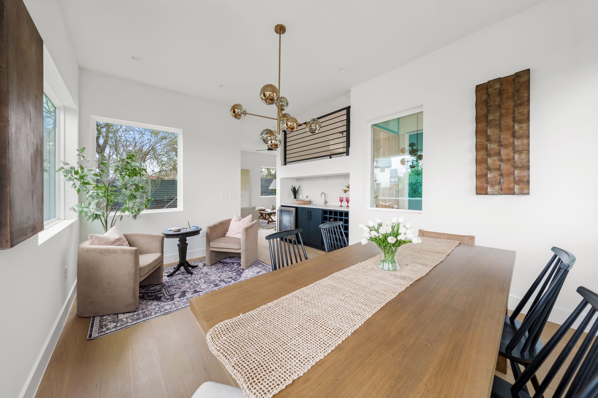 1703 Miami Drive Austin, TX 78733 - Photo 15 of 35 Dining Area with a sitting area surrounded by natural light