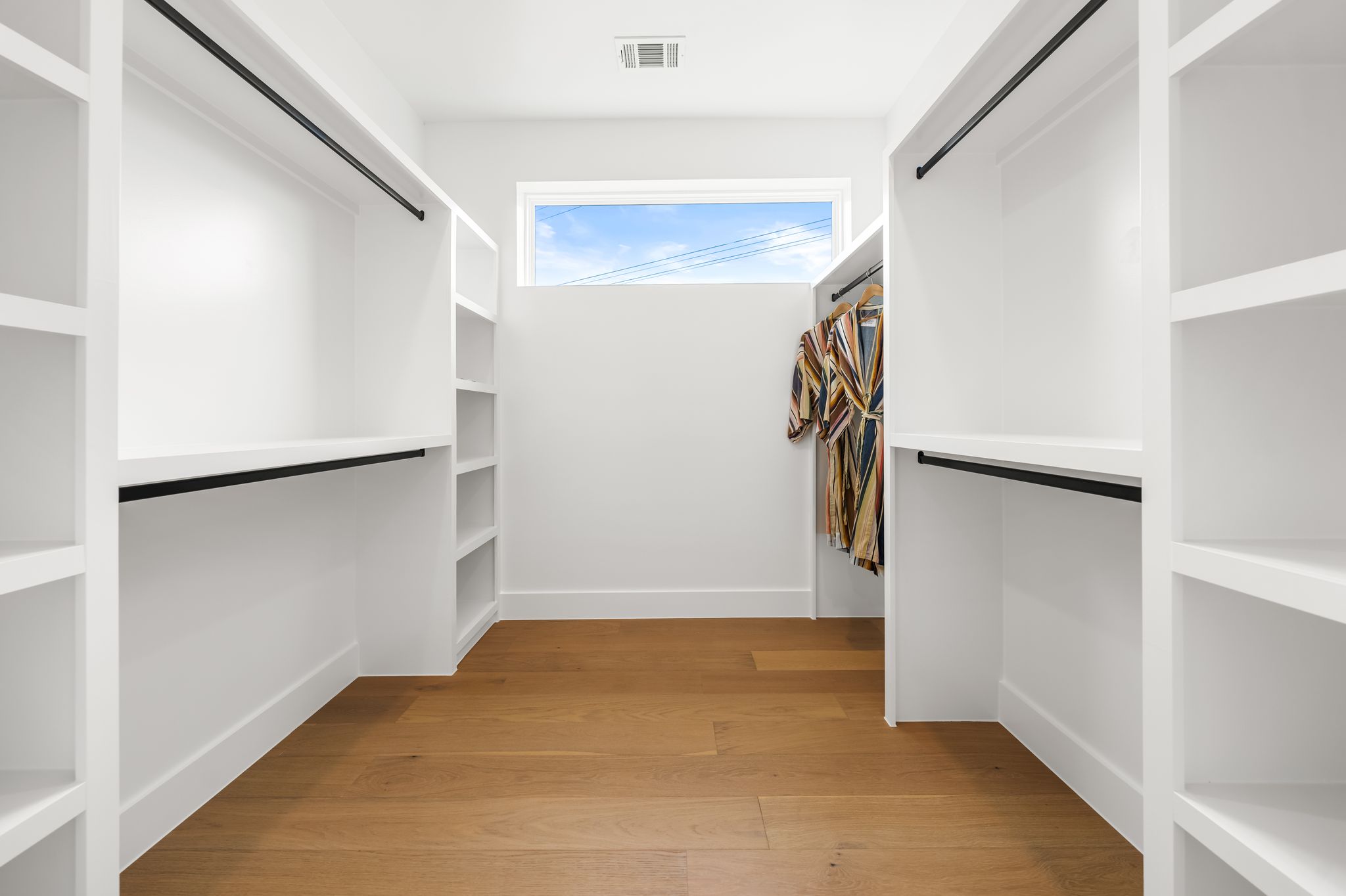 1703 Miami Drive Austin, TX 78733 - Photo 22 of 35 1 of 2 primary walk in closets