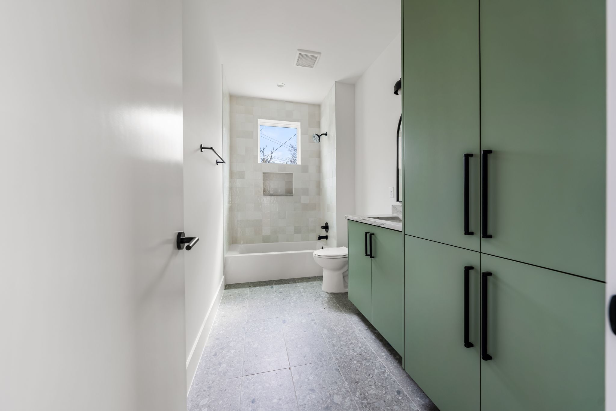 1703 Miami Drive Austin, TX 78733 - Photo 27 of 35 Ensuite bathroom with built in cabinetry