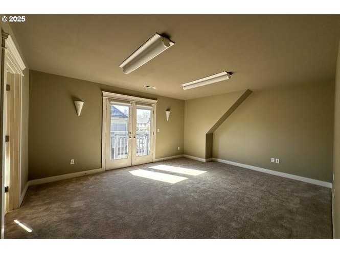 1505 Northeast Village Street Fairview, OR 97024 - Photo 18 of 33 a view of an empty room with windows