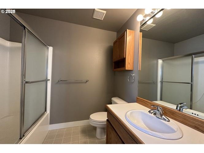 1505 Northeast Village Street Fairview, OR 97024 - Photo 29 of 33 a bathroom with a sink toilet and shower