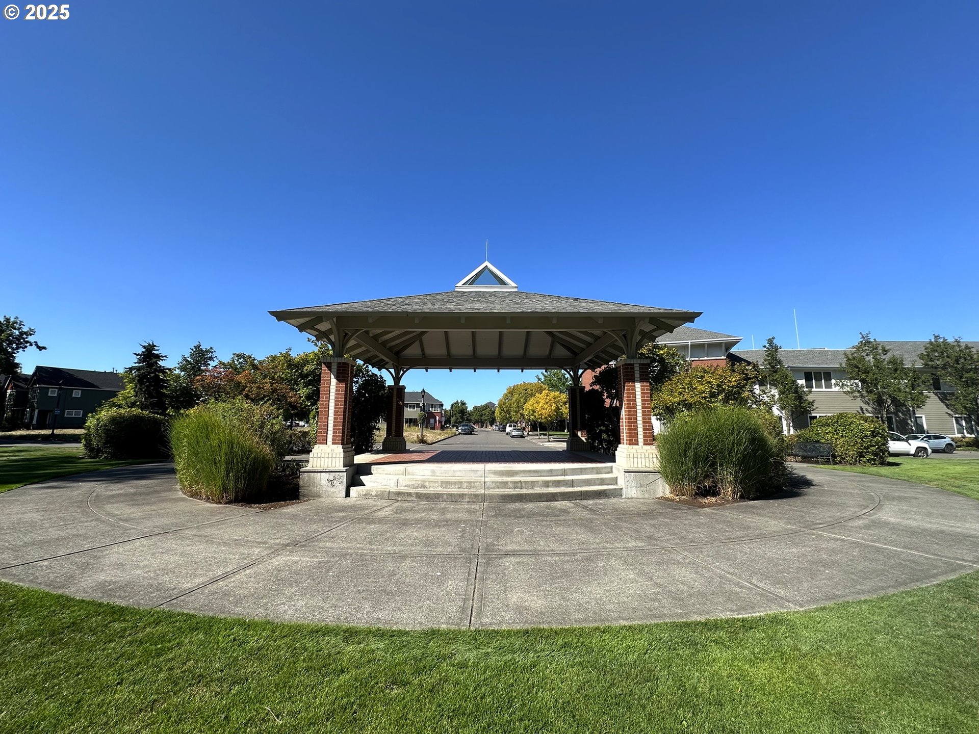1505 Northeast Village Street Fairview, OR 97024 - Photo 30 of 33 a view of a porch with a table and chairs under an umbrella