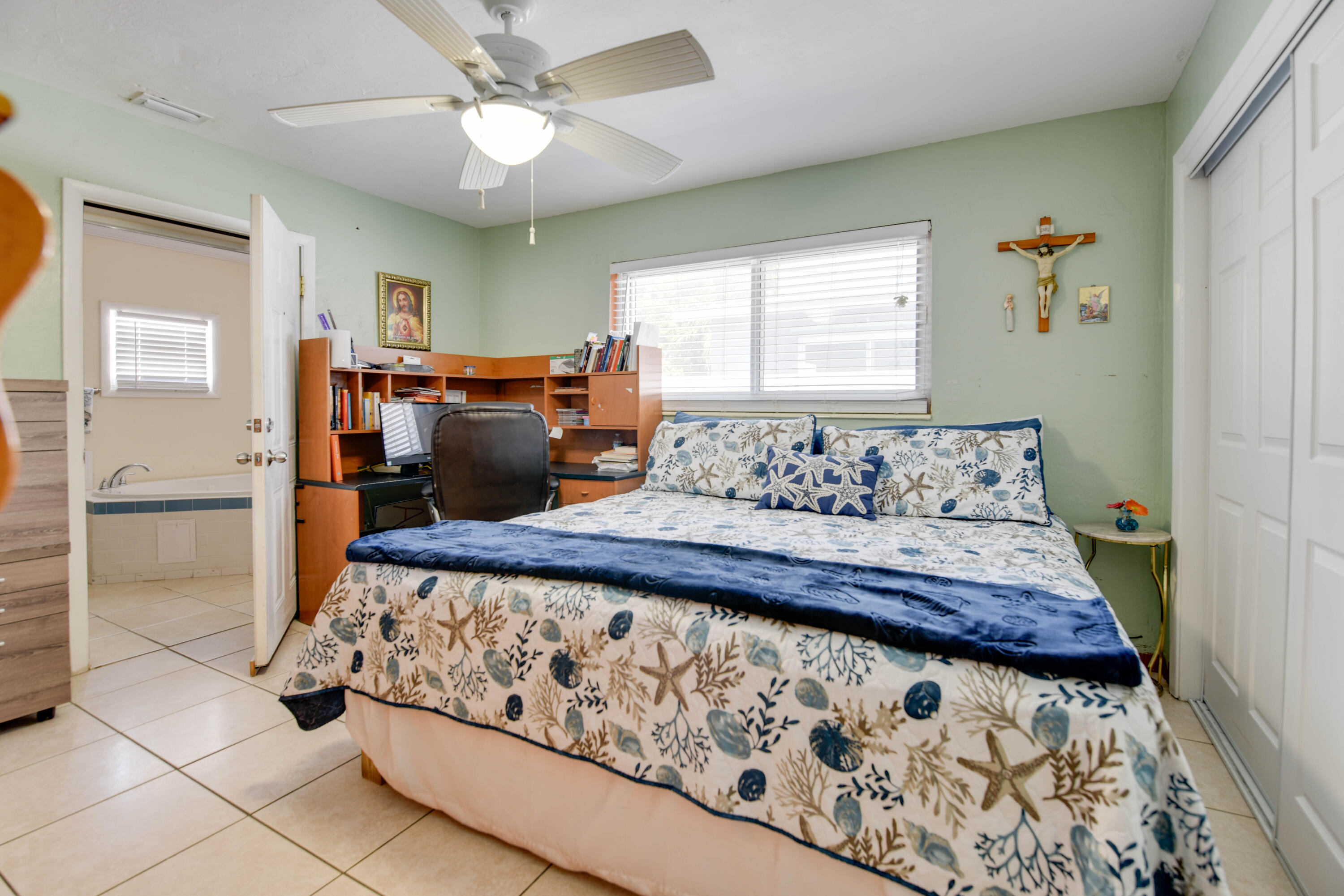 1524 5th Street Key West, FL 33040 - Photo 12 of 31 a bedroom with a bed and window