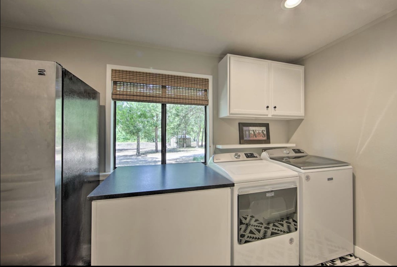 10630 River Ranch Road Kemp, TX 75143 - Photo 31 of 42 Laundry room with extra refrigerator and convenient storage space.