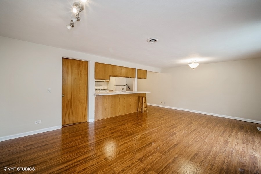 912 Chestnut Street Deerfield, IL 60015 - Photo 15 of 20 a view of a kitchen with wooden floor