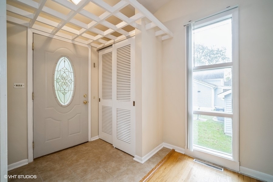 912 Chestnut Street Deerfield, IL 60015 - Photo 5 of 20 a view of an entryway with wooden floor