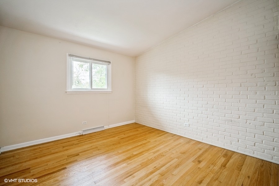 912 Chestnut Street Deerfield, IL 60015 - Photo 8 of 20 a view of empty room with wooden floor