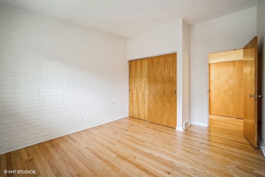 912 Chestnut Street Deerfield, IL 60015 - Photo 9 of 20 a view of an empty room with wooden floor