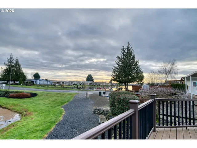 a view of a terrace with yard and a garden