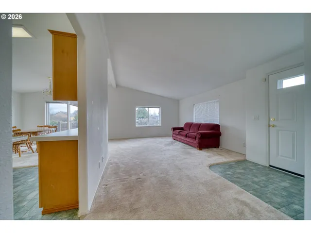a bathroom with a tub shower and sink
