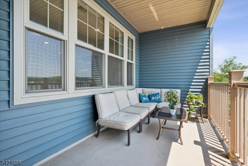 401 Mariners Pointe Hopatcong, NJ 07843 - Photo 19 of 42 a building outdoor space with patio furniture