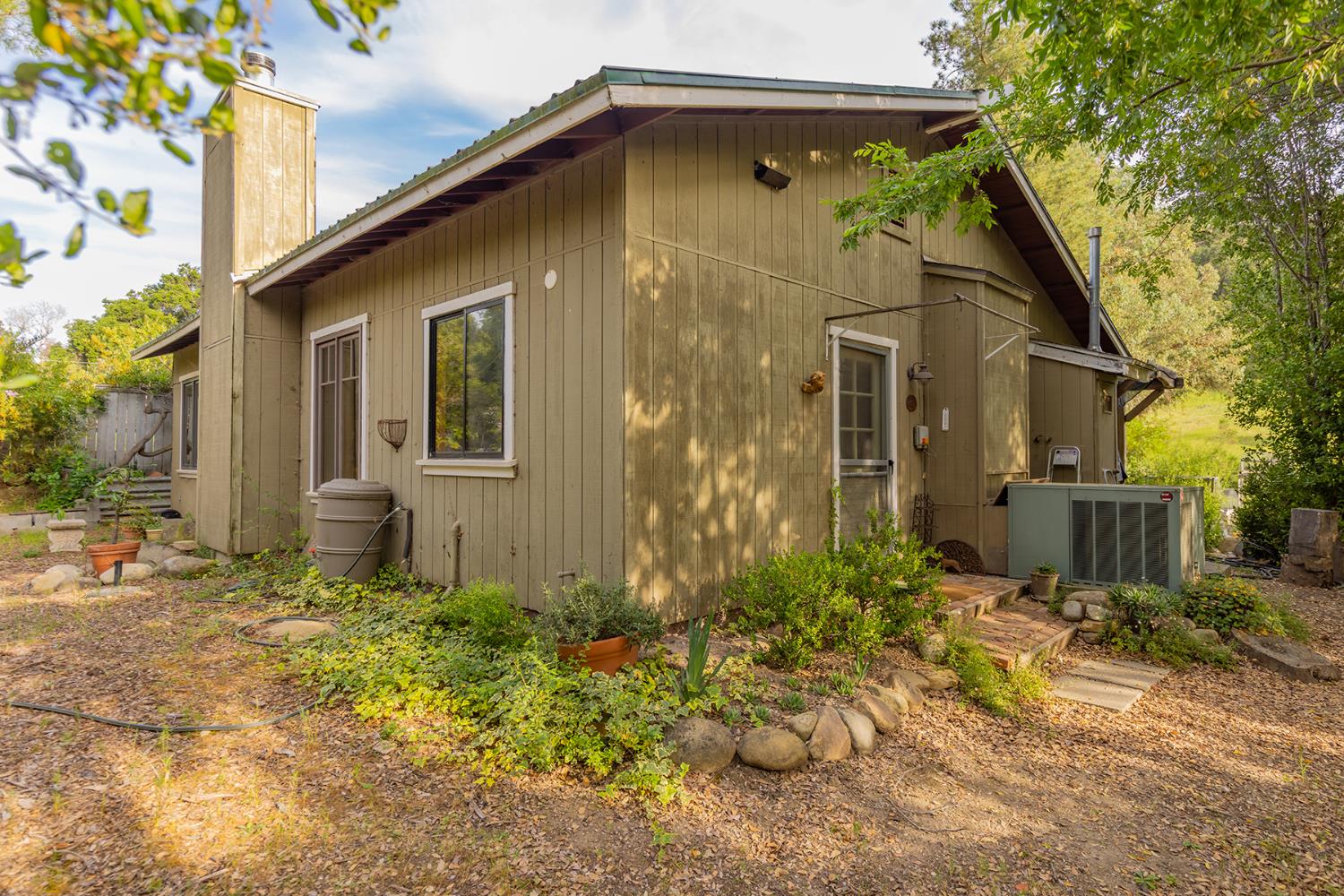 11954 Sulphur Mountain Road Ojai, CA 93023 - Photo 19 of 41 a front view of a house with a yard