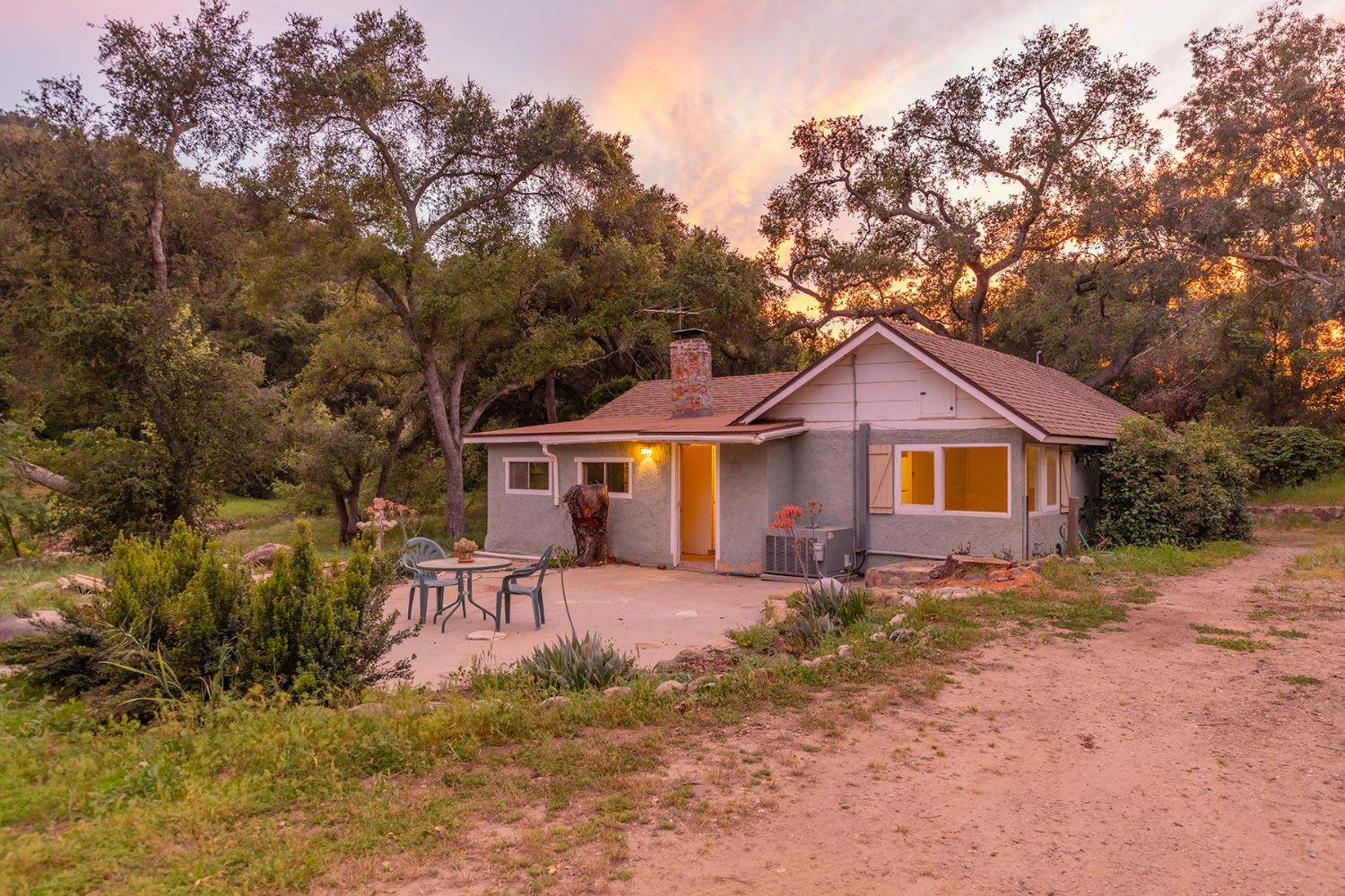 11954 Sulphur Mountain Road Ojai, CA 93023 - Photo 3 of 41 a front view of a house with a yard