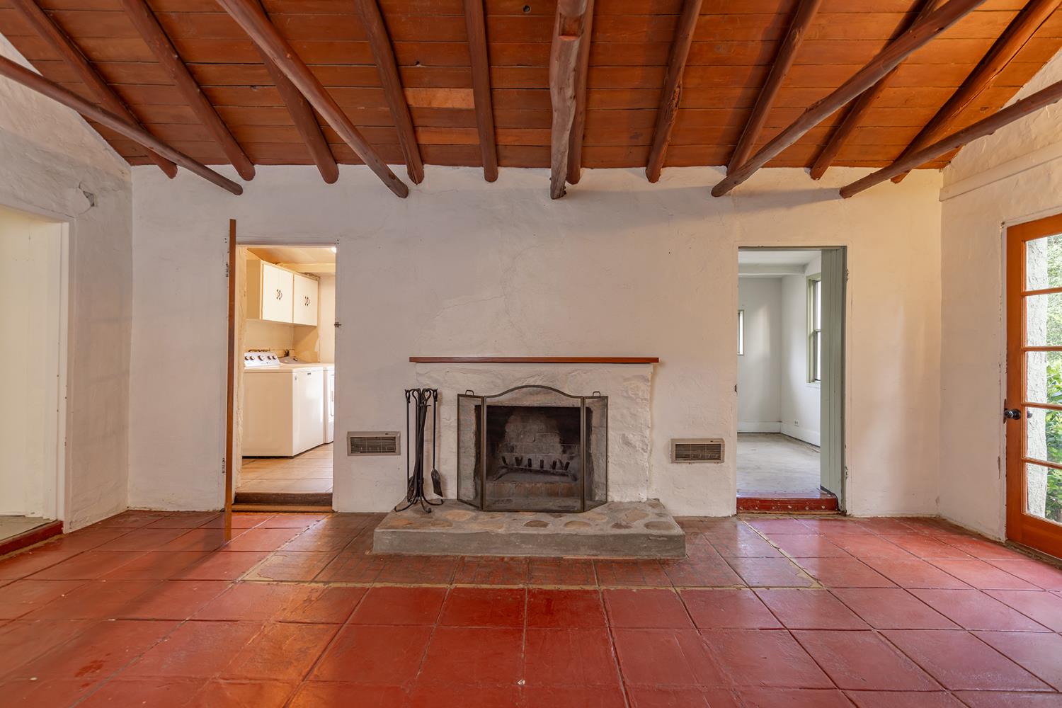 11954 Sulphur Mountain Road Ojai, CA 93023 - Photo 32 of 41 a view of an empty room with a fireplace and a window