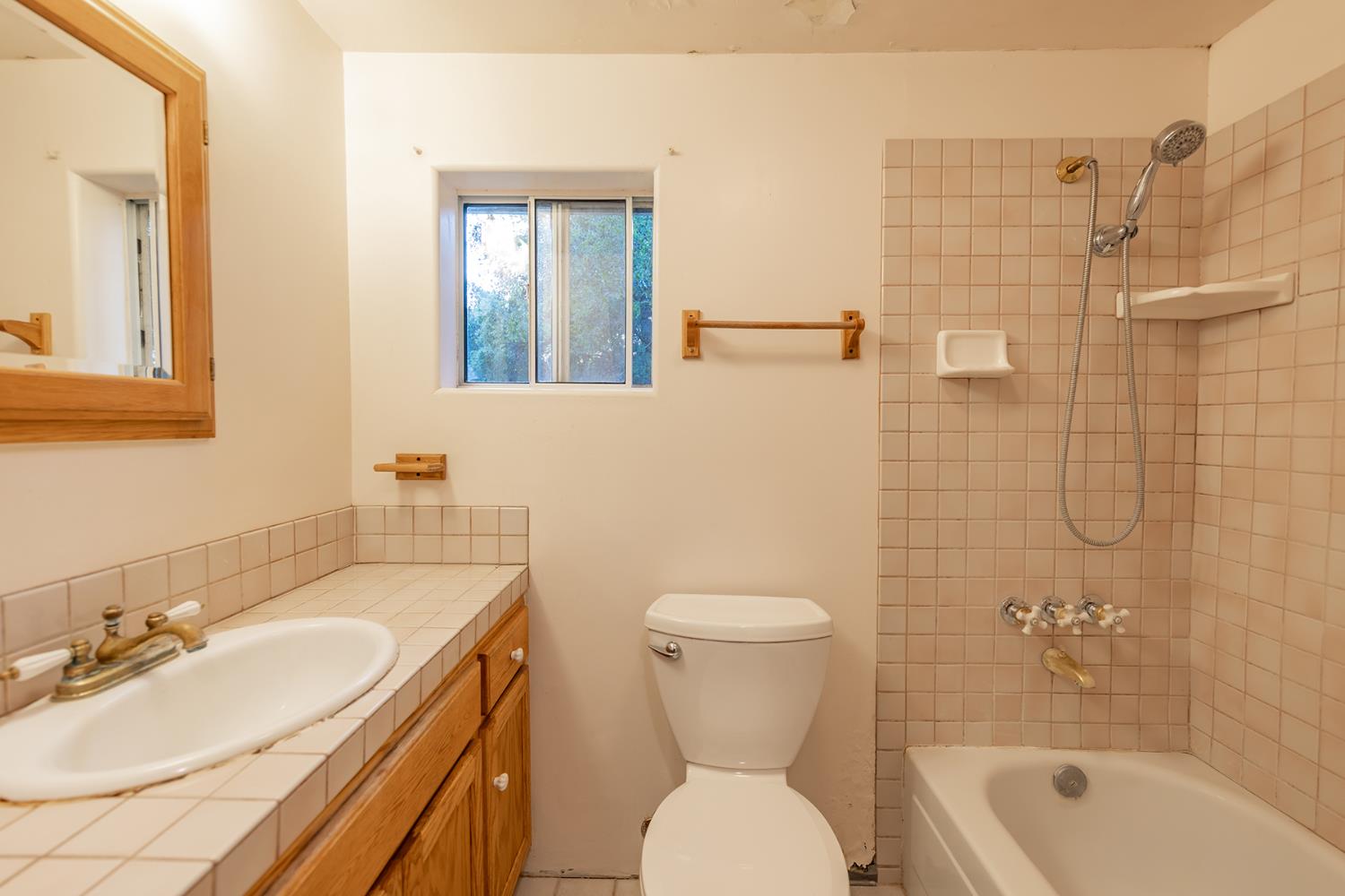 11954 Sulphur Mountain Road Ojai, CA 93023 - Photo 34 of 41 a bathroom with a sink a toilet and shower