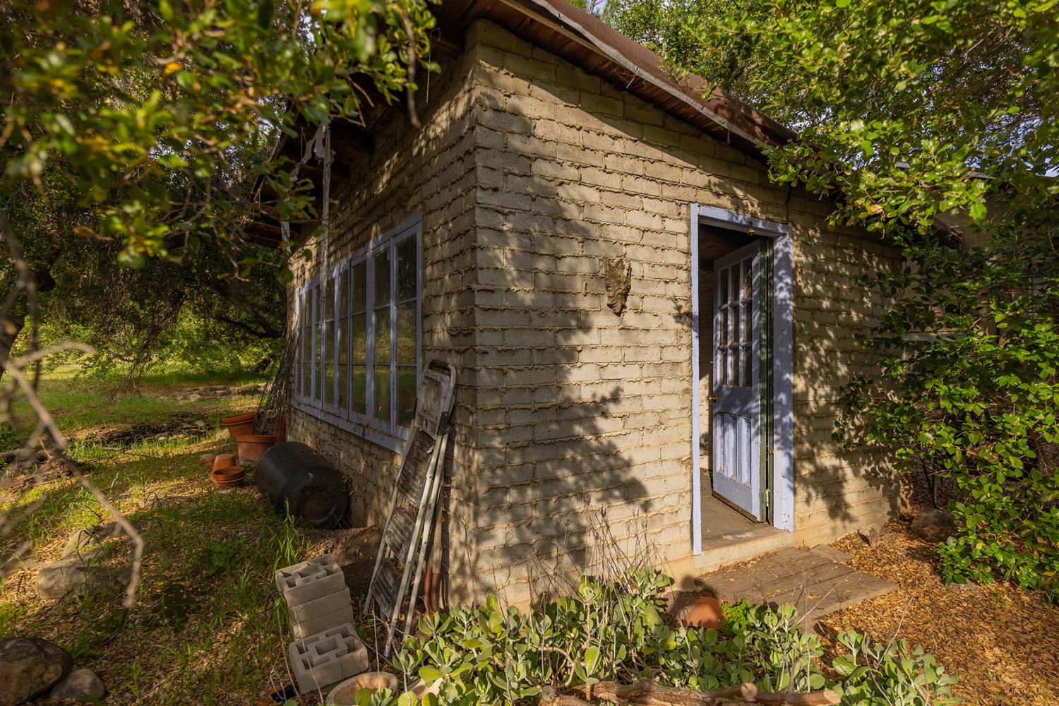 11954 Sulphur Mountain Road Ojai, CA 93023 - Photo 39 of 41 a front view of a house with a yard