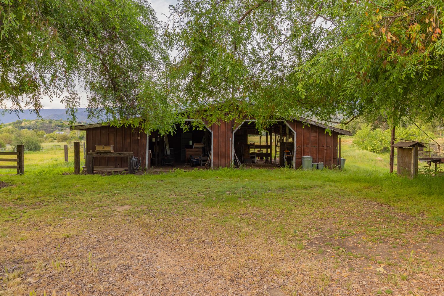 11954 Sulphur Mountain Road Ojai, CA 93023 - Photo 9 of 41 a front view of a house with a garden